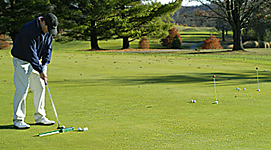 Golf training on practice golf green